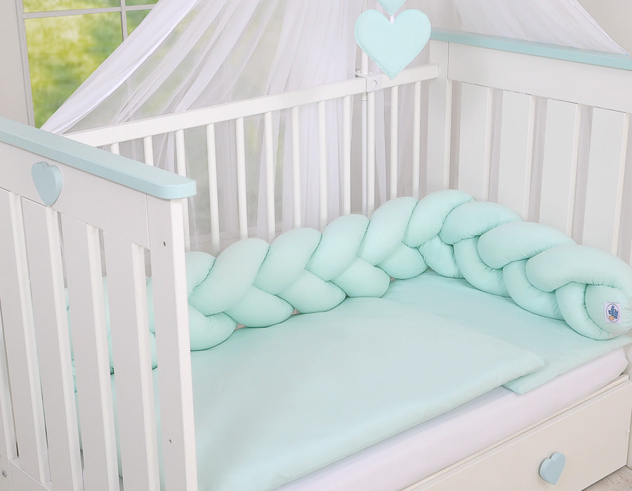Flätad knutstötskydd - sängstötskydd - skyddar mot stötar - 100% bomull - mintgrön