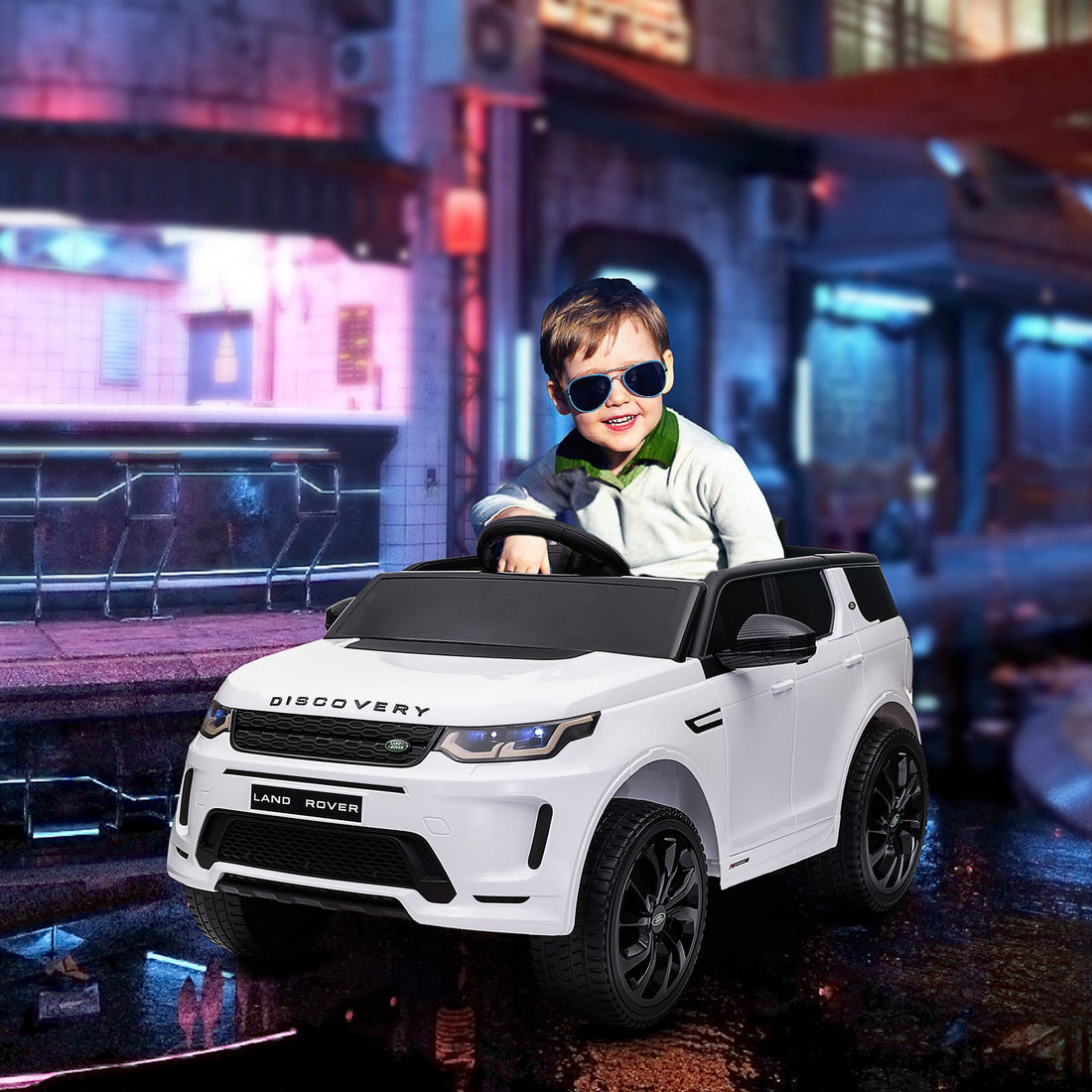 12V Elektro-Kinderauto Land Rover Discovery Sport | Farbe: Weiß und Schwarz | Abmessungen: 65,5x106x51 cm