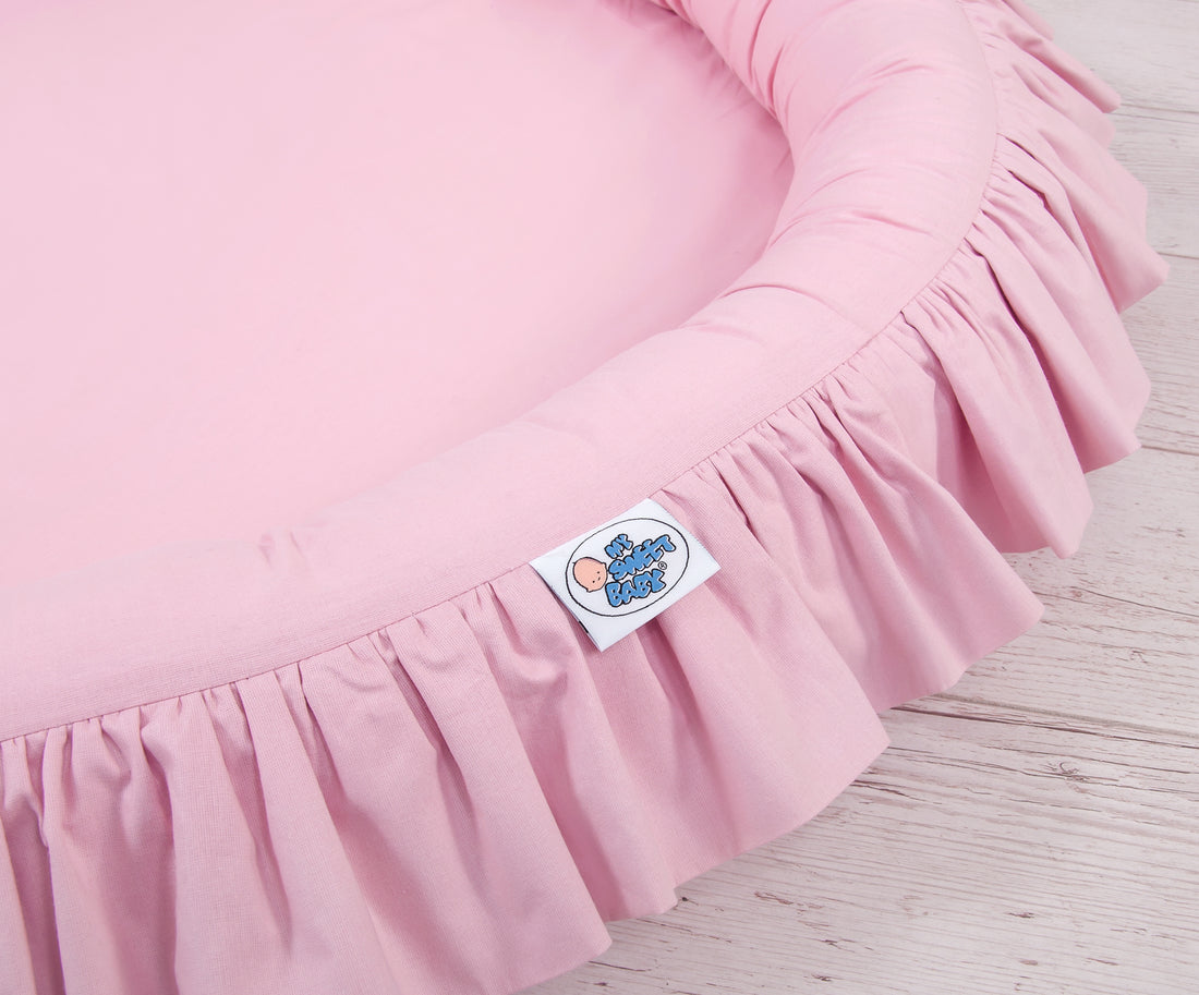 Babynest met volant - speelnest - veilige opstaande rand voor bescherming - roze - katoen