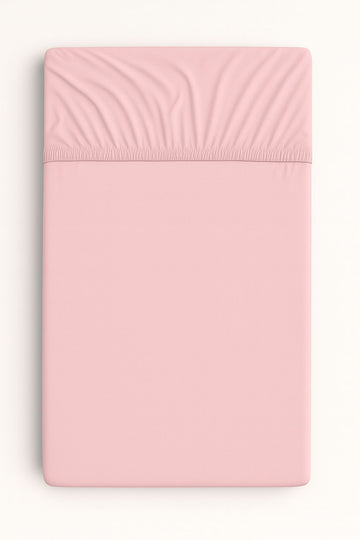 Pastellrosa dra-på-lakan - stretchlakan i bomull - perfekt passform för babysäng 140x70 cm