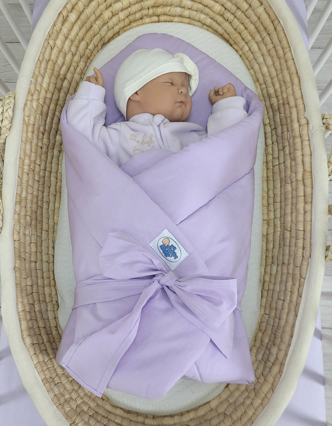 Dubbelsidigt babynest - linda i kon - justerbar rosett och allergivänlig bomull